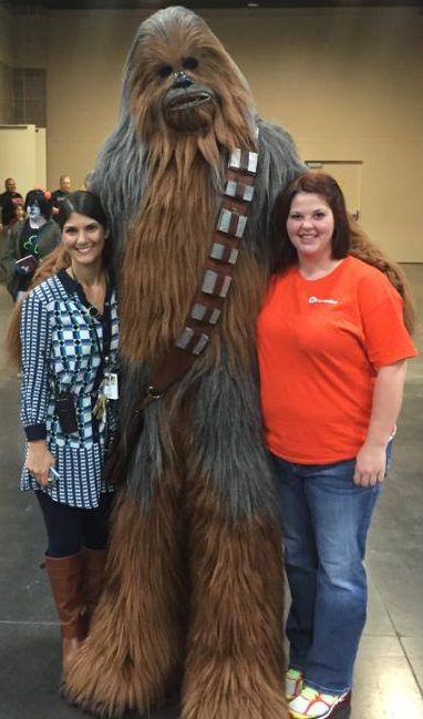 Kate Jackson, left, with Chewbacca and Becky Williams of ACES (All Convention & Expo Services), the in-house decorator company, at the Fanboy Expo at the Knoxville Convention Center.