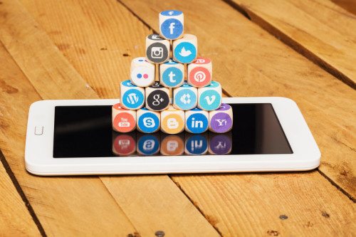 Social media logos on tablet computer
