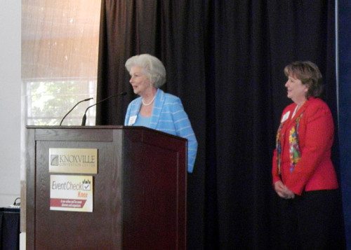 Natalie Haslam speaks at the launch party. Cynthia Moxley is at right.