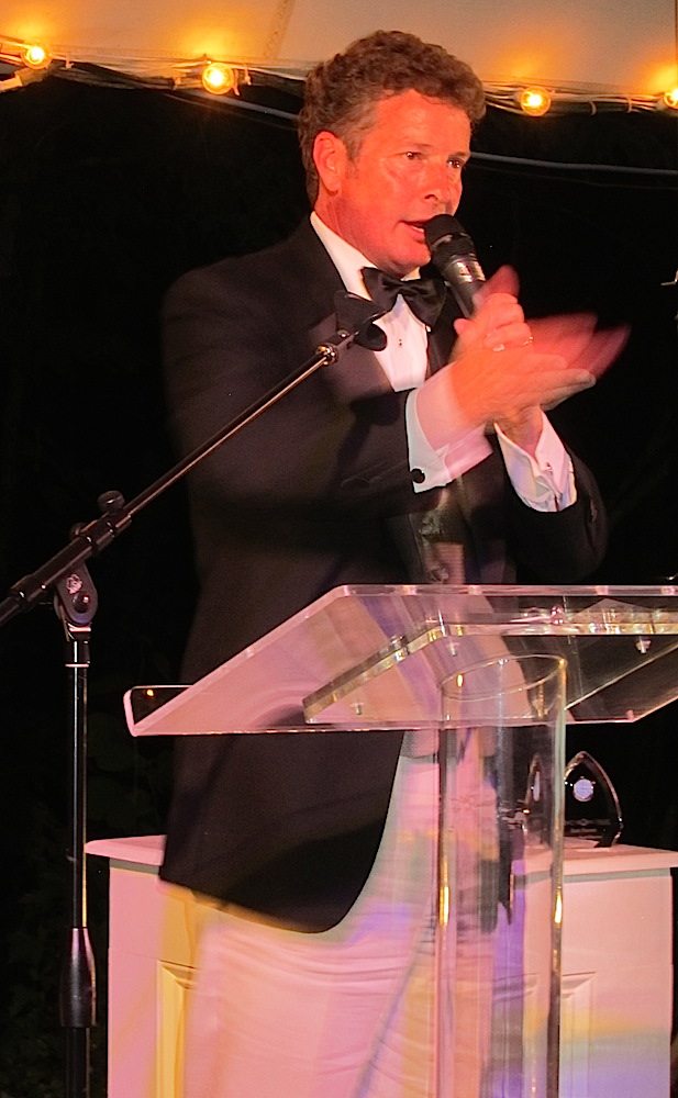 Auctioneer Blake Wilson during a fundraiser for Clarence Brown Theatre. (Blue Streak photo)